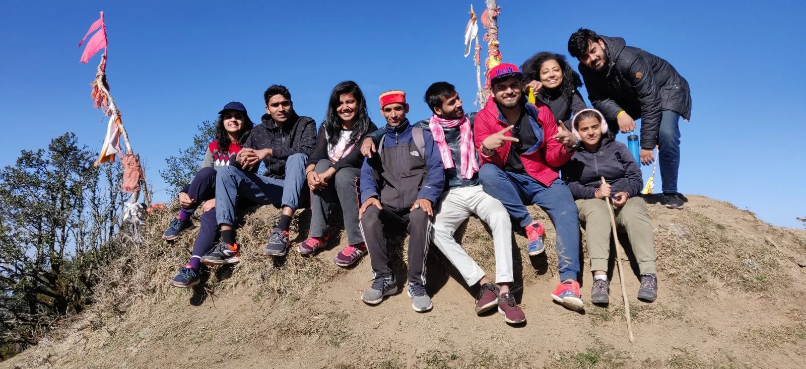 Our trek group at the top, prayer flags flying