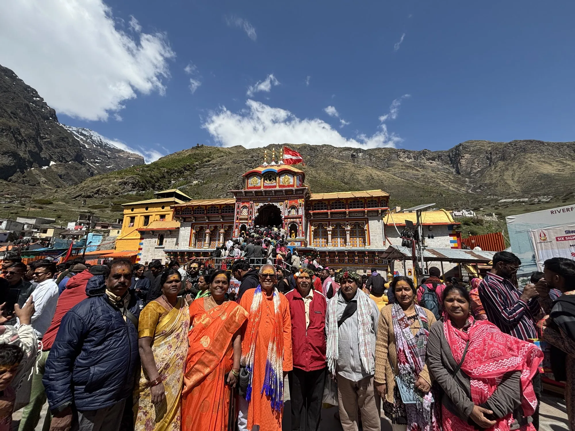 Yatris at Badrinath Dham on a clear May morning
